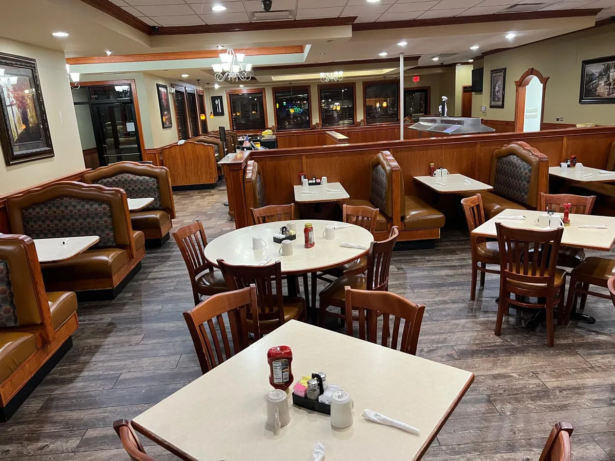 Tables and booths looking back toward the entrance